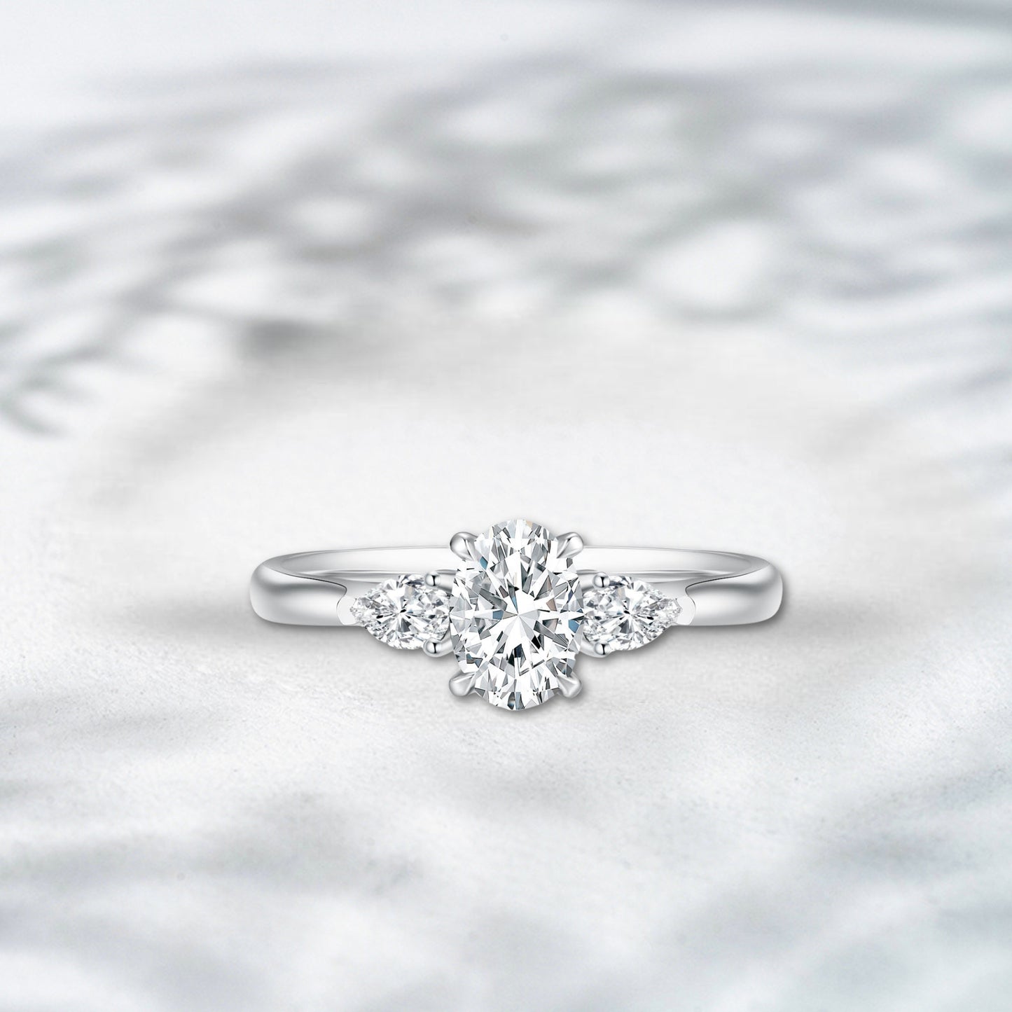 QOB Emerald Allure 2.043ct Oval Cut Lab Diamond Ring with Tapered Baguette Side Stones in 18K White Gold