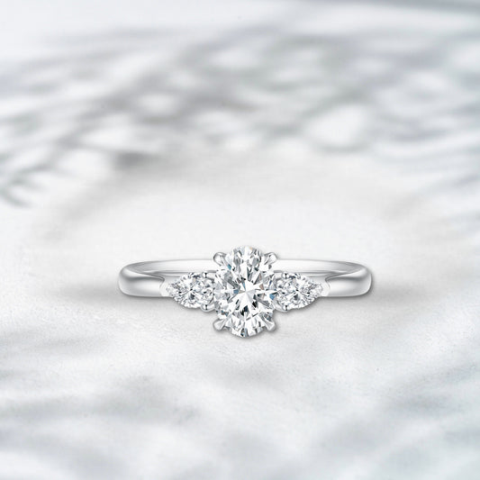 QOB Emerald Allure 2.043ct Oval Cut Lab Diamond Ring with Tapered Baguette Side Stones in 18K White Gold