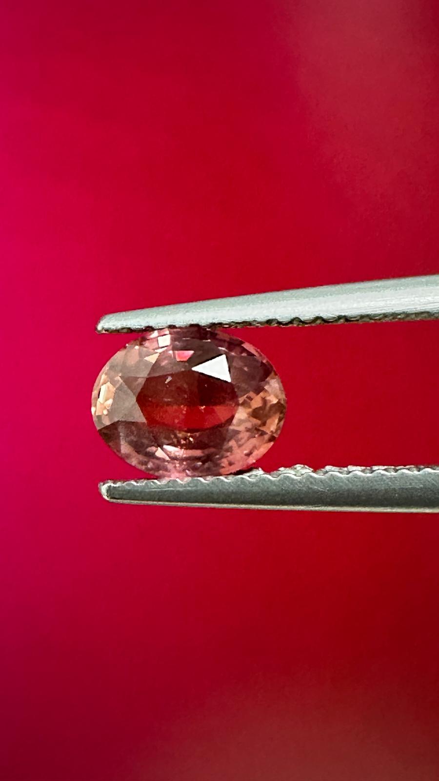 1.42 ct Natural Unheated Padparadscha Sapphire (AIGS Certified) – Orangy Pink Oval Brilliant