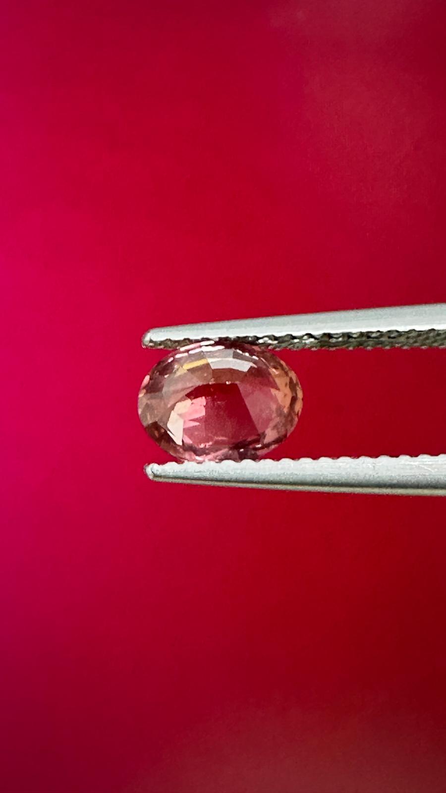 1.42 ct Natural Unheated Padparadscha Sapphire (AIGS Certified) – Orangy Pink Oval Brilliant